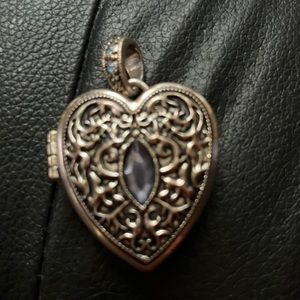 Silver heart locket with blue rinestones